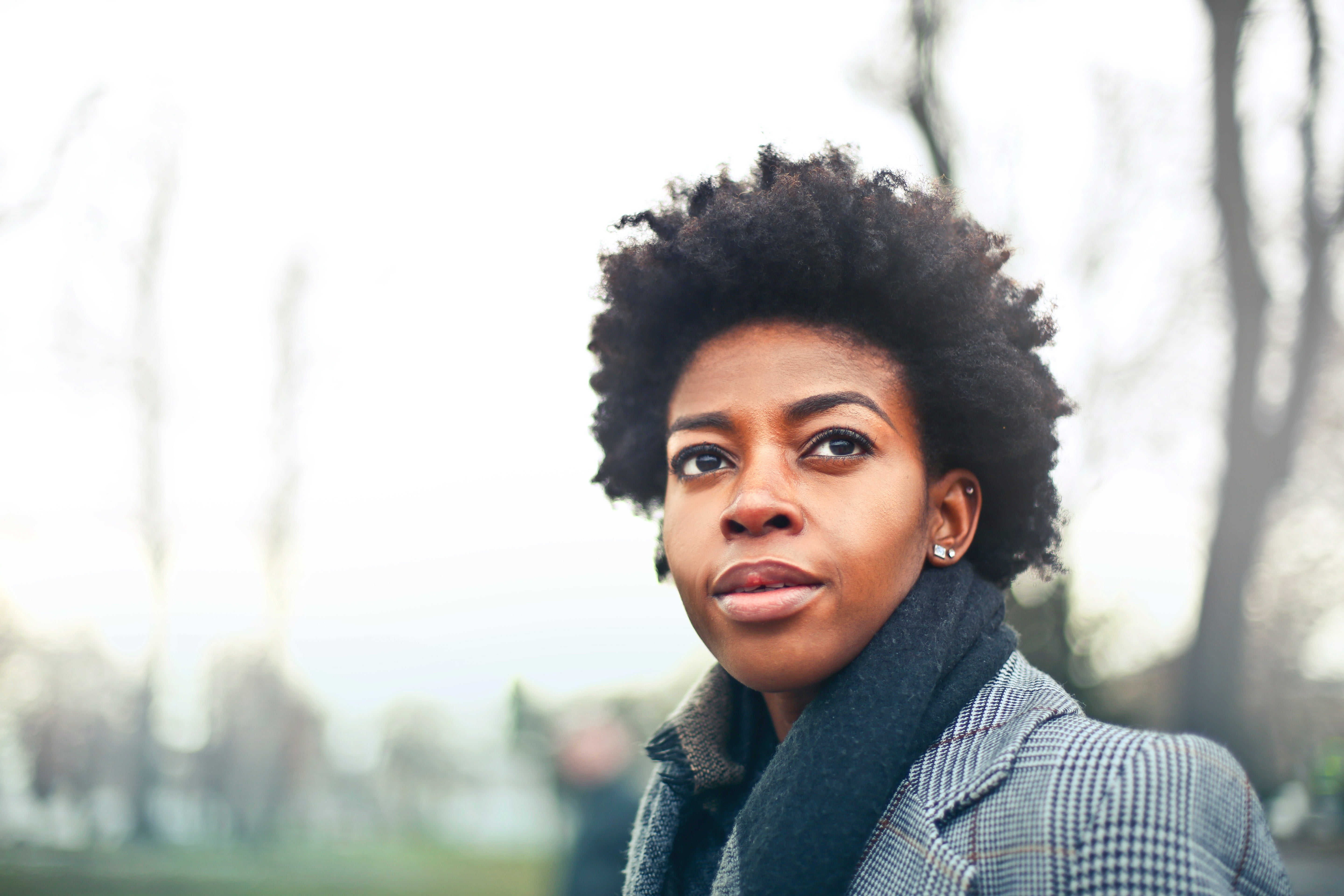 Black woman looking forward into the horizon