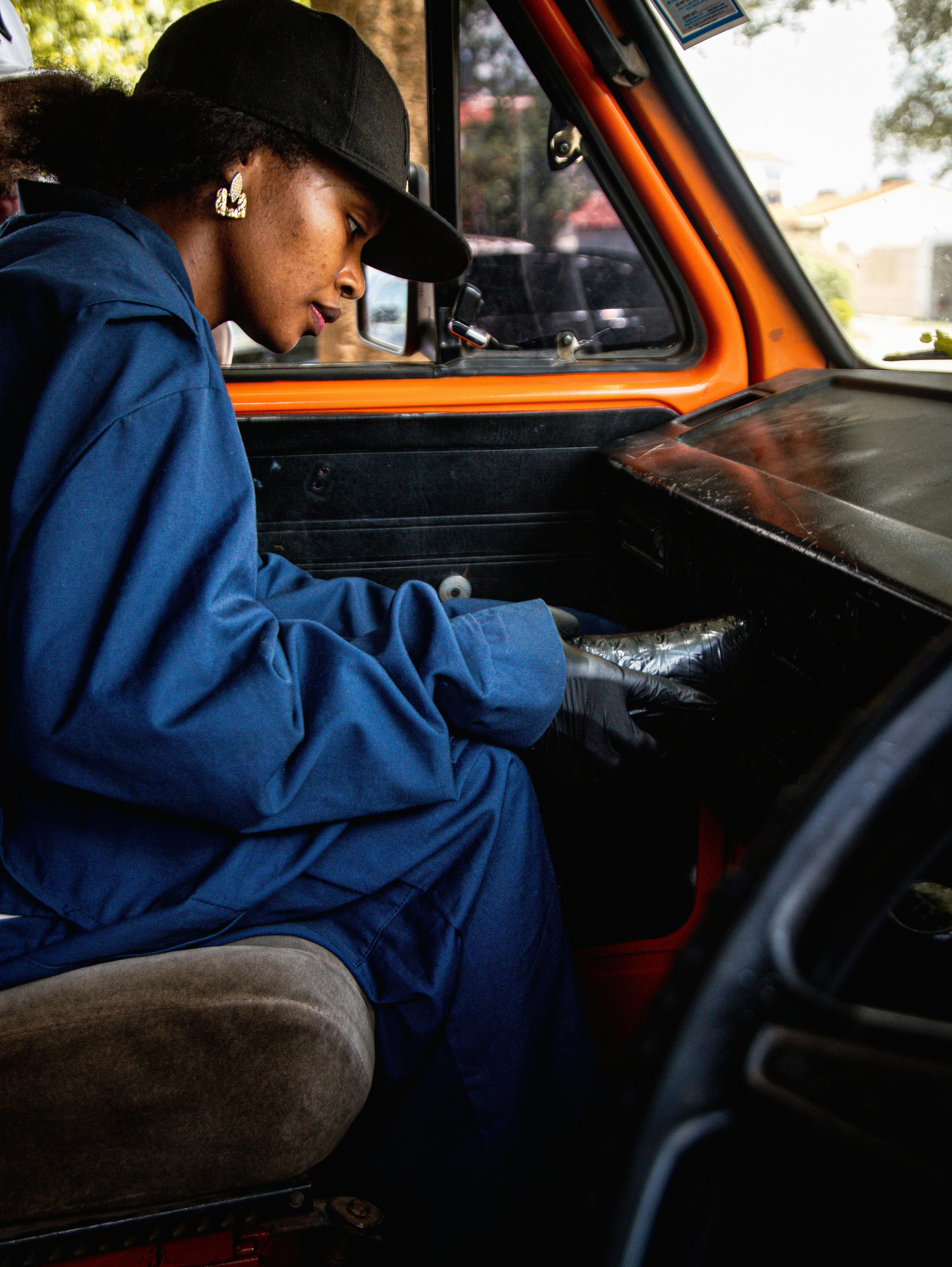 Black woman working a technical mechanical trade